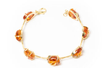 Gold plated bracelet with amber stones For Sale