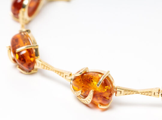 Gold plated bracelet with amber stones For Sale