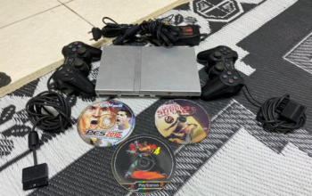 PS2 with 3cds,cables and 2 controllers for sale