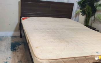 Queen size bed with mattress going cheap for sale