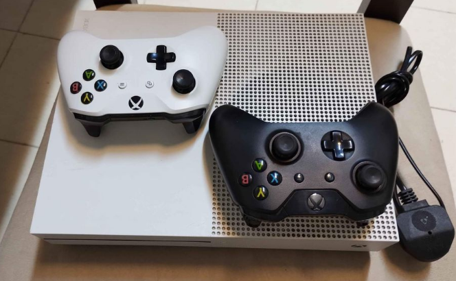 Xbox One S with 2 controllers and cable for sale
