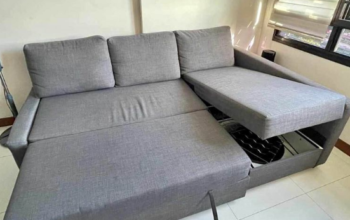 IKEA L shape sofa bed (gray) for sale