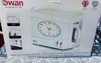 Clock alarm with tea maker for sale