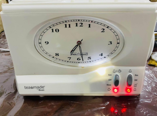 Clock alarm with tea maker for sale