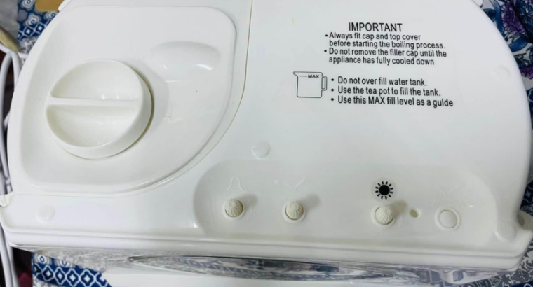 Clock alarm with tea maker for sale