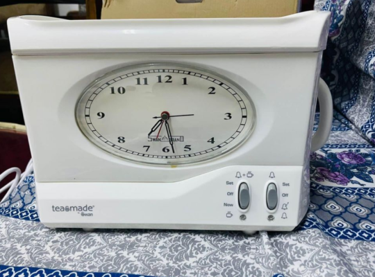 Clock alarm with tea maker for sale