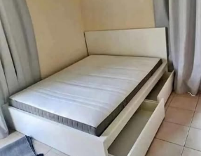 IKEA bed with storage in good condition for sale