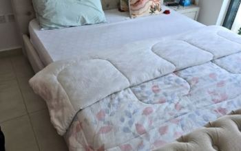 king size bed with a nearly new frame for sale