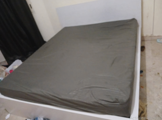 Large bed with mattress for sale