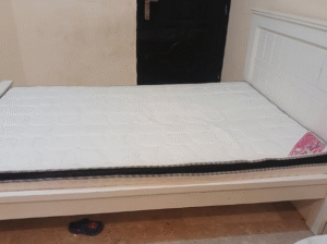 Large bed with mattress for sale