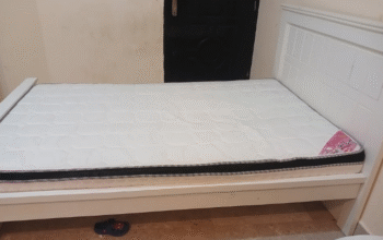 Large bed with mattress for sale