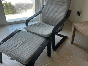 POÄNG armchair with footstool for sale