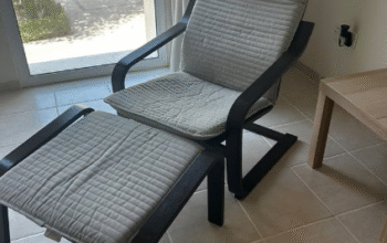 POÄNG armchair with footstool for sale