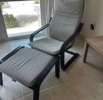 POÄNG armchair with footstool for sale