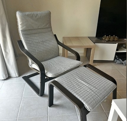 POÄNG armchair with footstool for sale