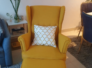 Ikea yellow armchair with the stool for sale