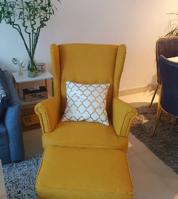 Ikea yellow armchair with the stool for sale