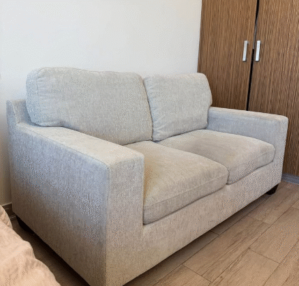 2 seater beige sofa Modern look for sale