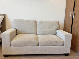 2 seater beige sofa Modern look for sale