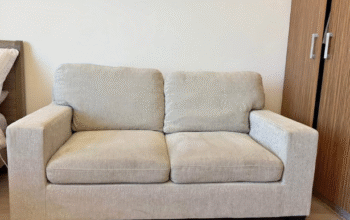 2 seater beige sofa Modern look for sale