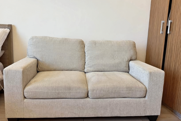 2 seater beige sofa Modern look for sale